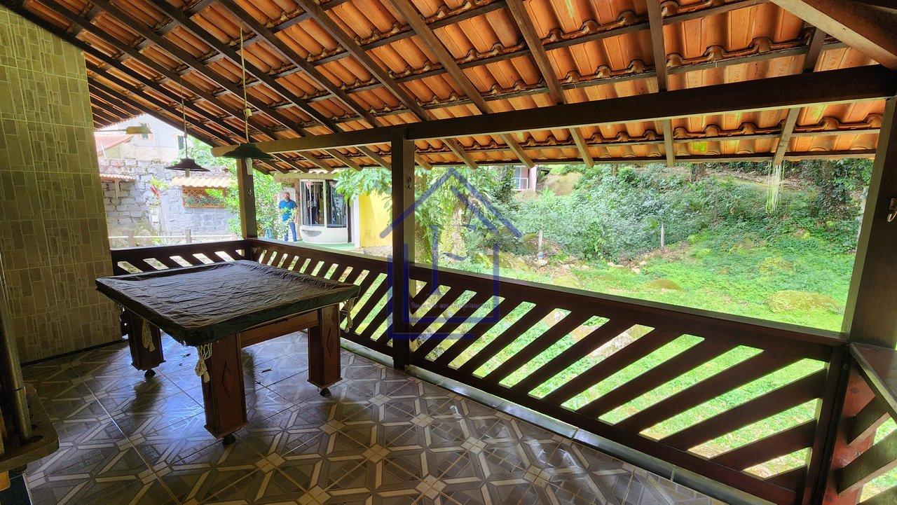 Casa com ótimo terreno dentro de condomínio em Guapimirim - Guapimirim - 