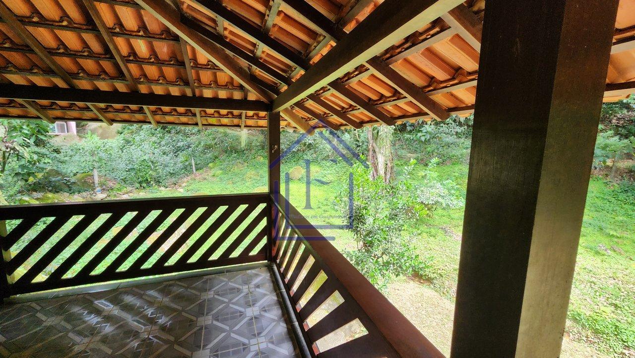 Casa com ótimo terreno dentro de condomínio em Guapimirim - Guapimirim - 