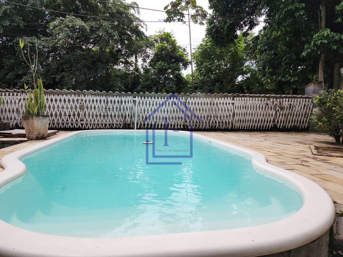 Casa com ótimo terreno dentro de condomínio em Guapimirim - Guapimirim - 