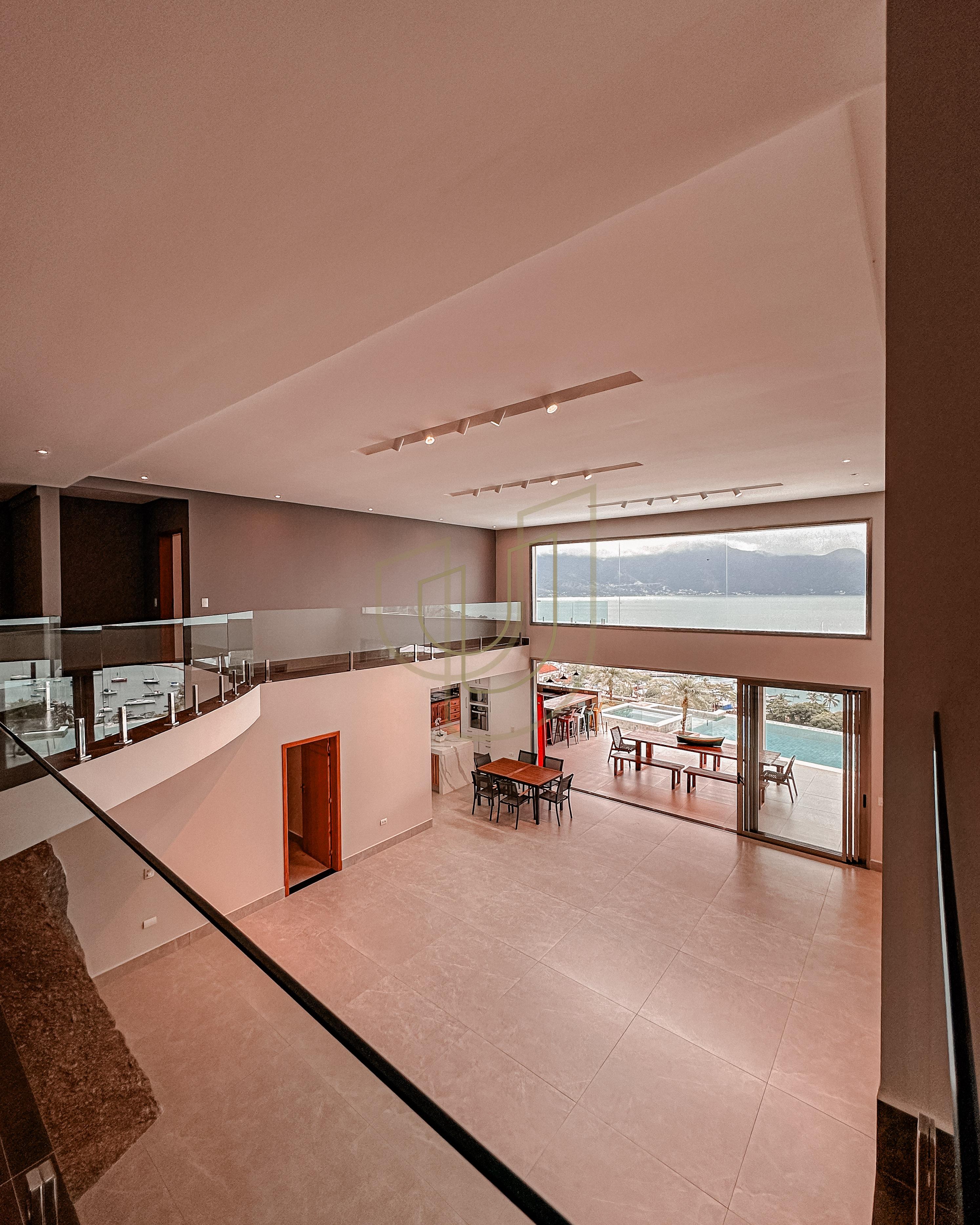 Mans&atilde;o de luxo com arquitetura em meio as rochas com 7 su&iacute;tes em Centro - Ilhabela/SP  Ilhabela - 