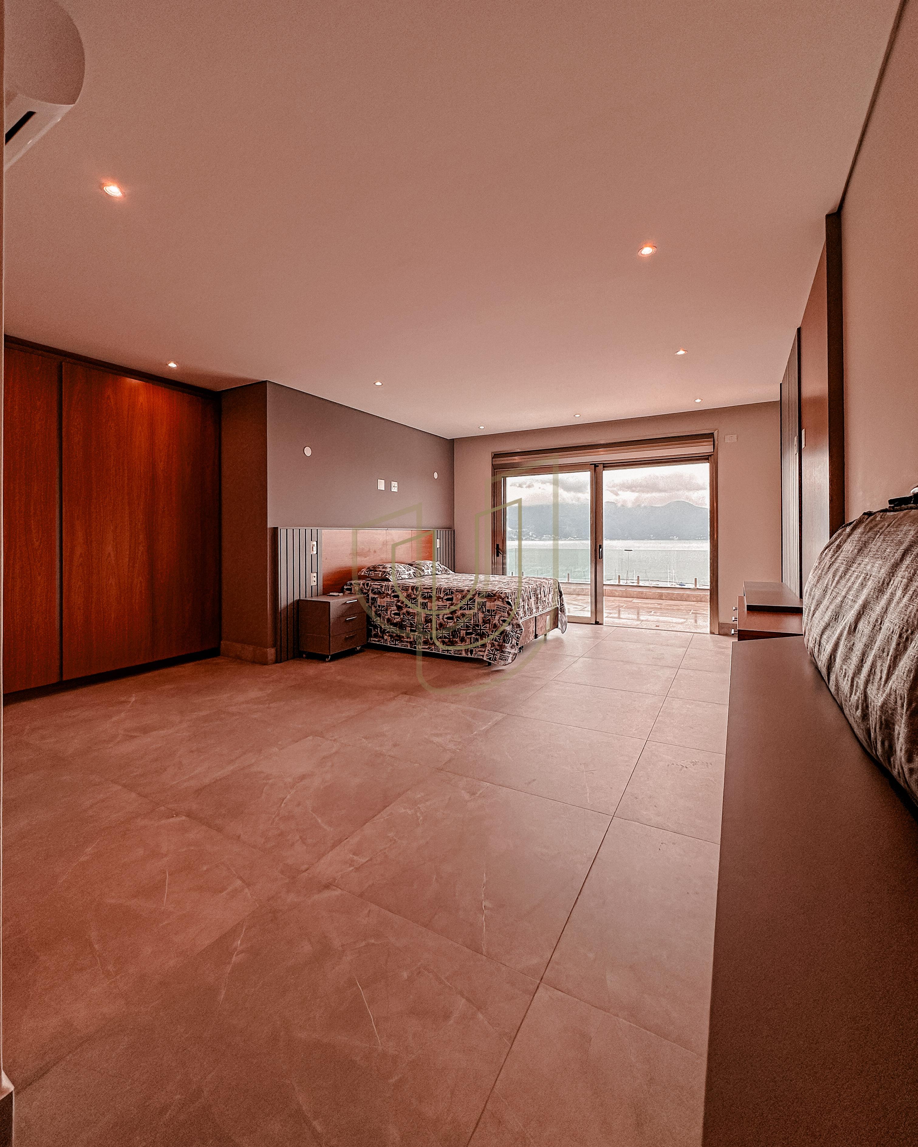 Mans&atilde;o de luxo com arquitetura em meio as rochas com 7 su&iacute;tes em Centro - Ilhabela/SP  Ilhabela - 