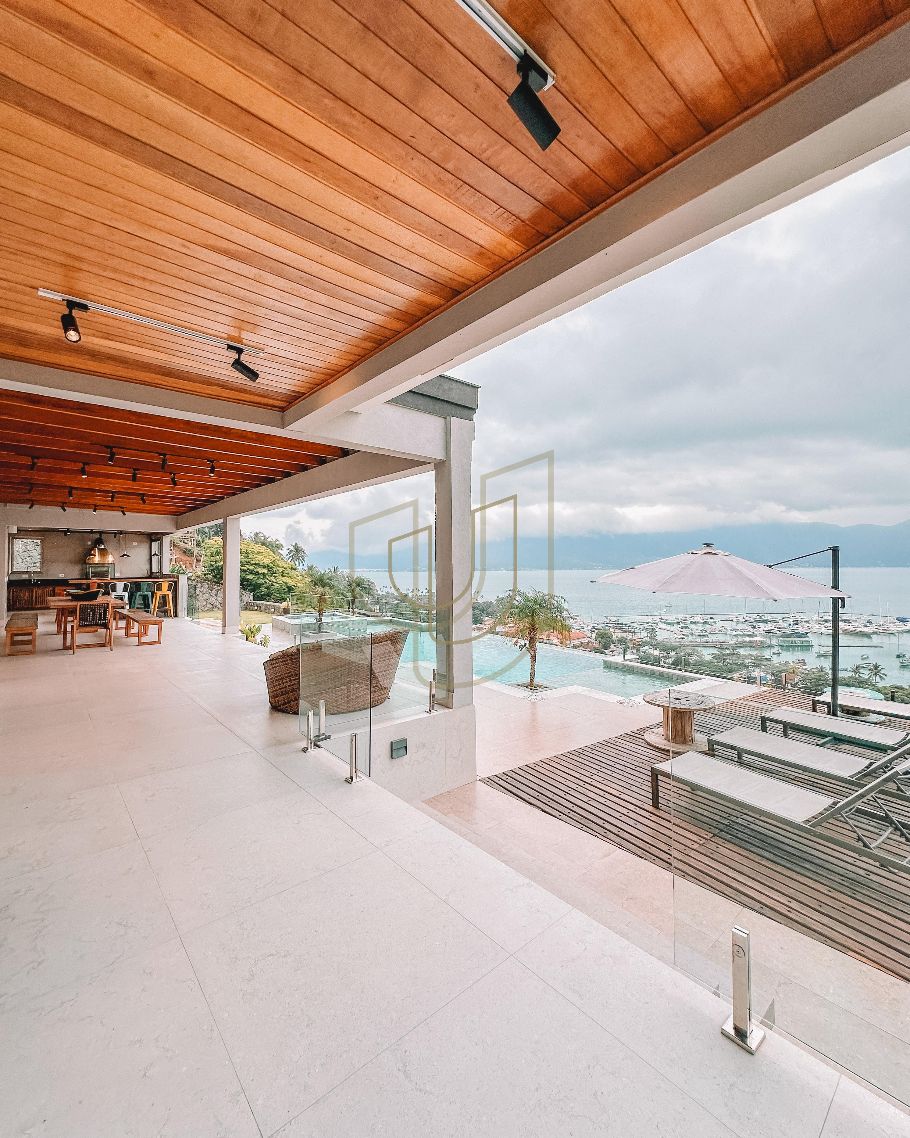 Mans&atilde;o de luxo com arquitetura em meio as rochas com 7 su&iacute;tes em Centro - Ilhabela/SP  Ilhabela - 