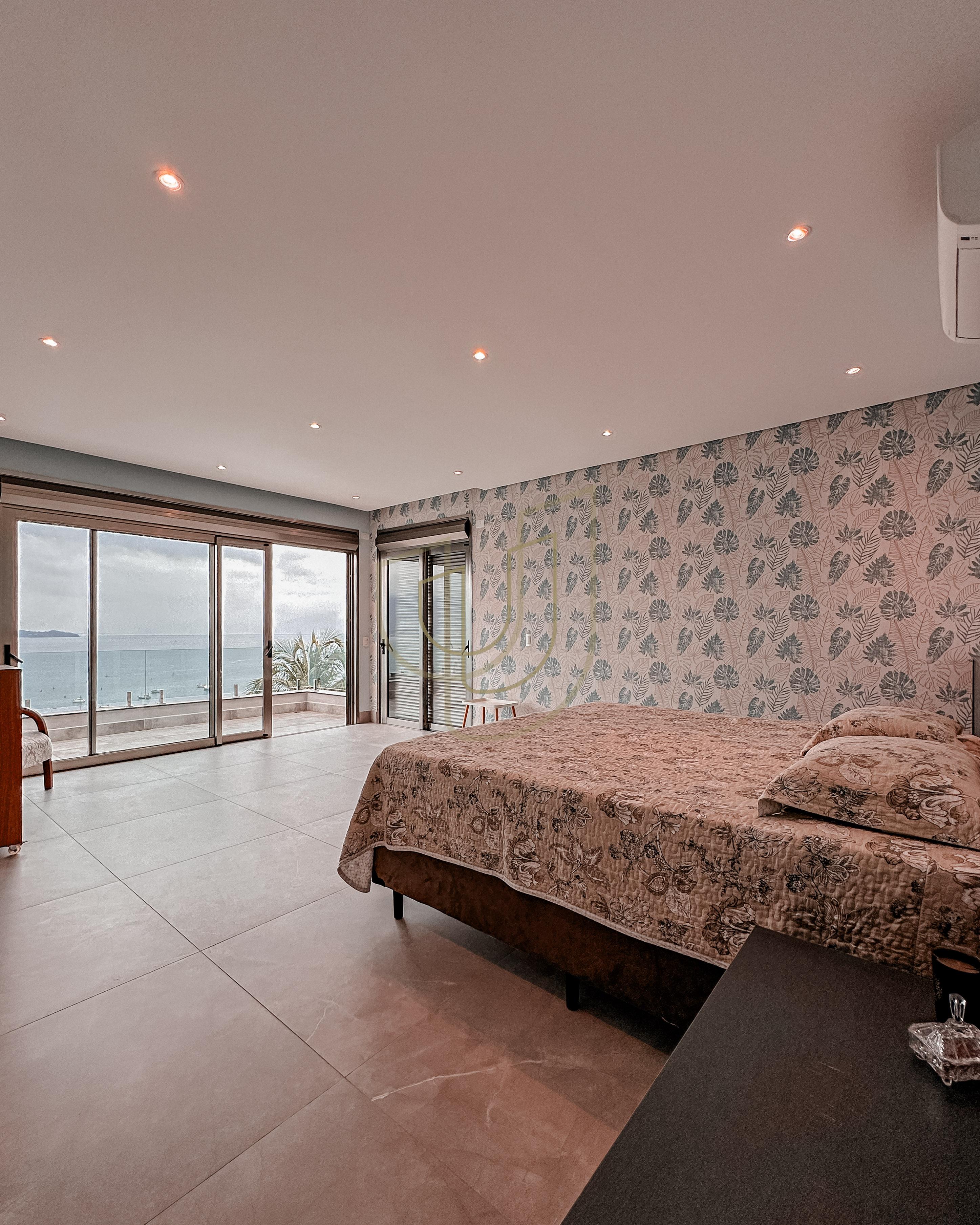 Mans&atilde;o de luxo com arquitetura em meio as rochas com 7 su&iacute;tes em Centro - Ilhabela/SP  Ilhabela - 