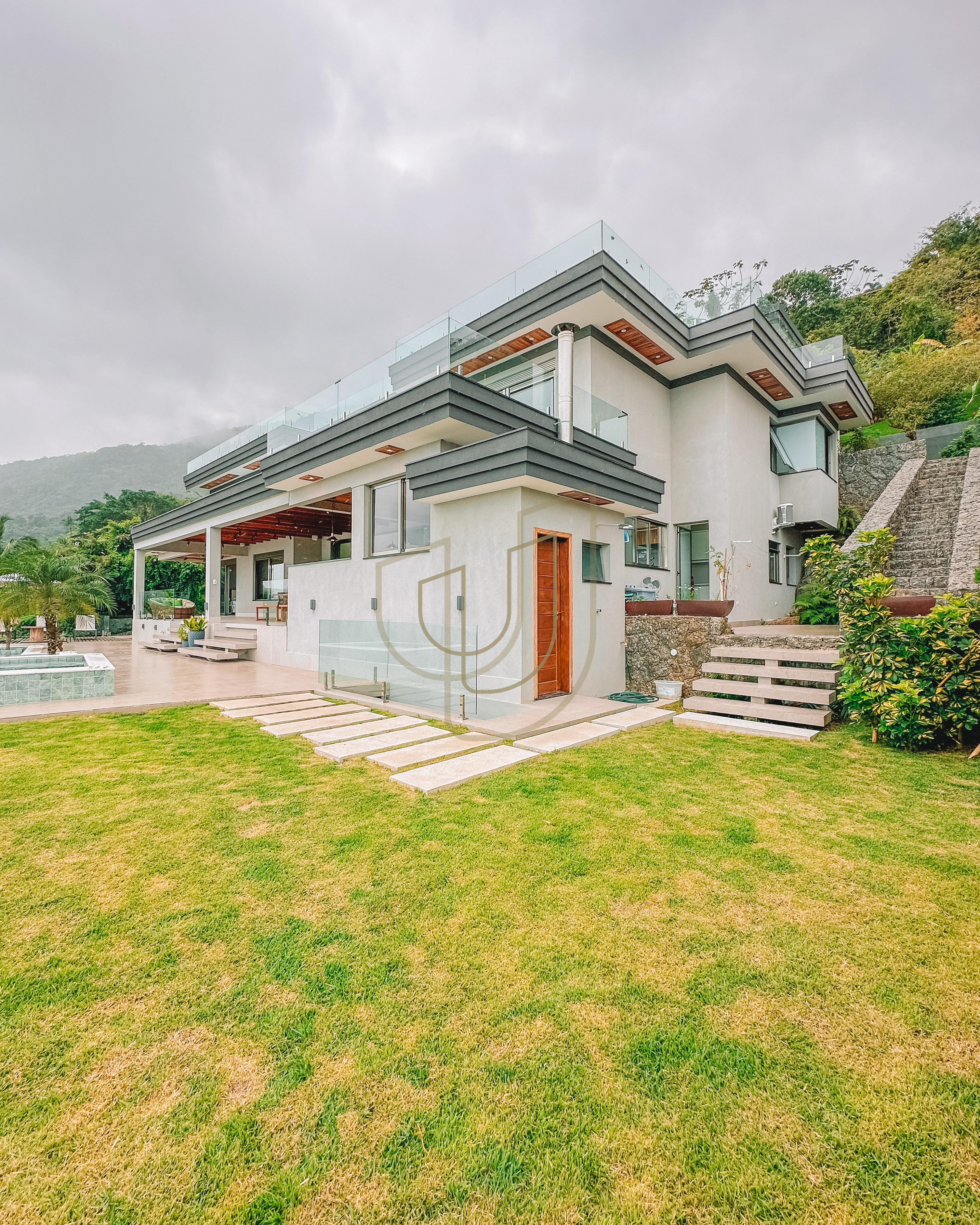 Mans&atilde;o de luxo com arquitetura em meio as rochas com 7 su&iacute;tes em Centro - Ilhabela/SP  Ilhabela - 