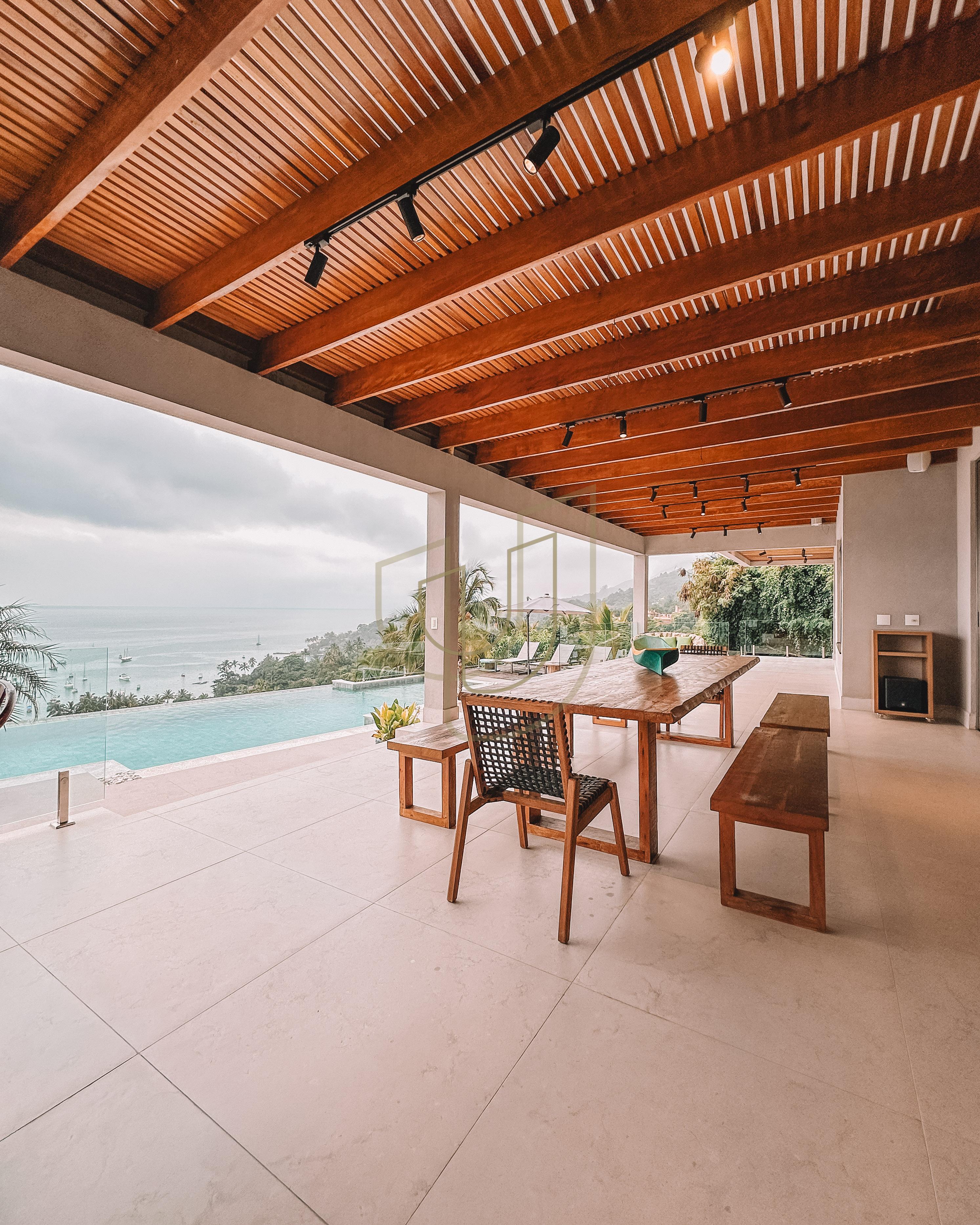 Mans&atilde;o de luxo com arquitetura em meio as rochas com 7 su&iacute;tes em Centro - Ilhabela/SP  Ilhabela - 