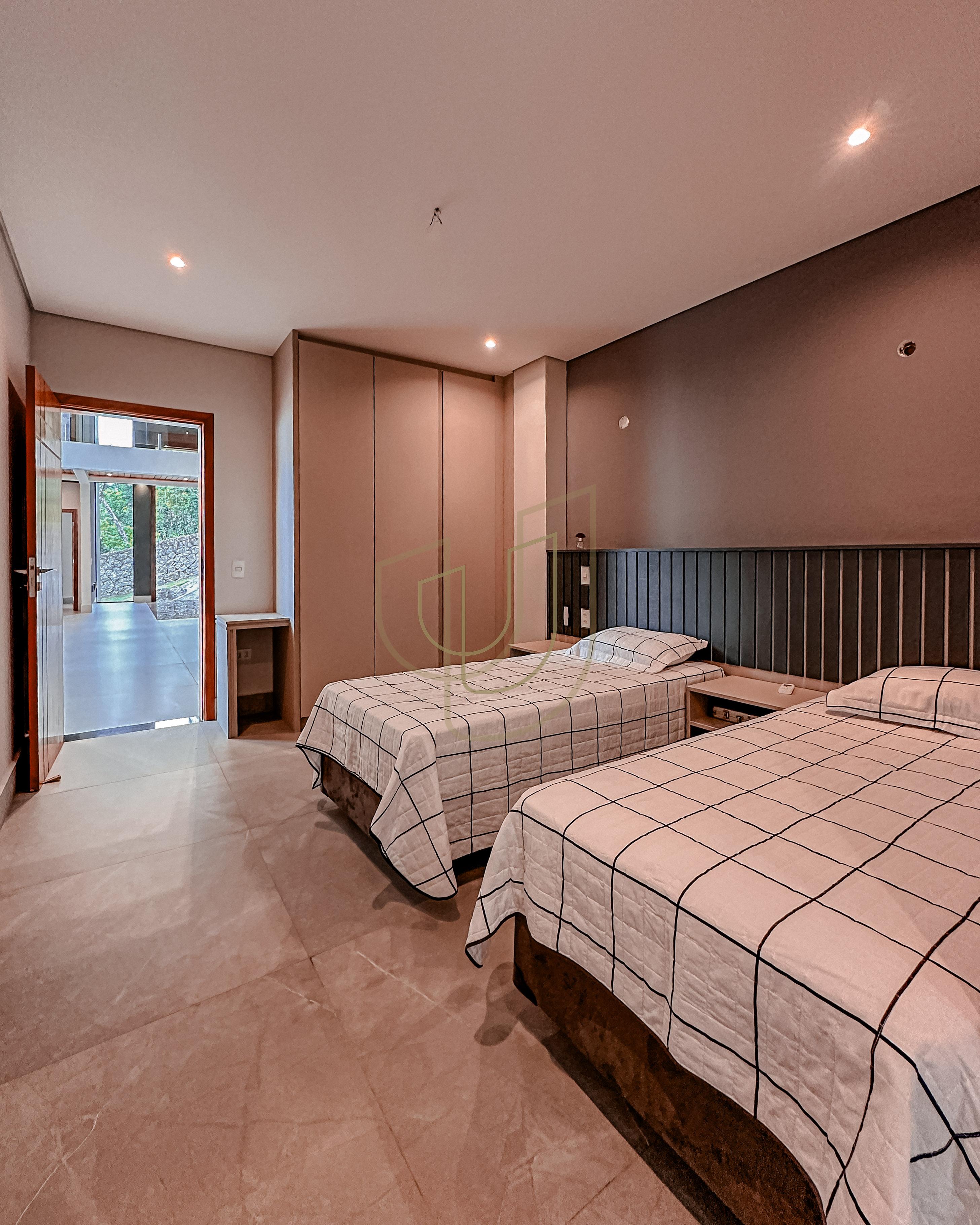 Mans&atilde;o de luxo com arquitetura em meio as rochas com 7 su&iacute;tes em Centro - Ilhabela/SP  Ilhabela - 