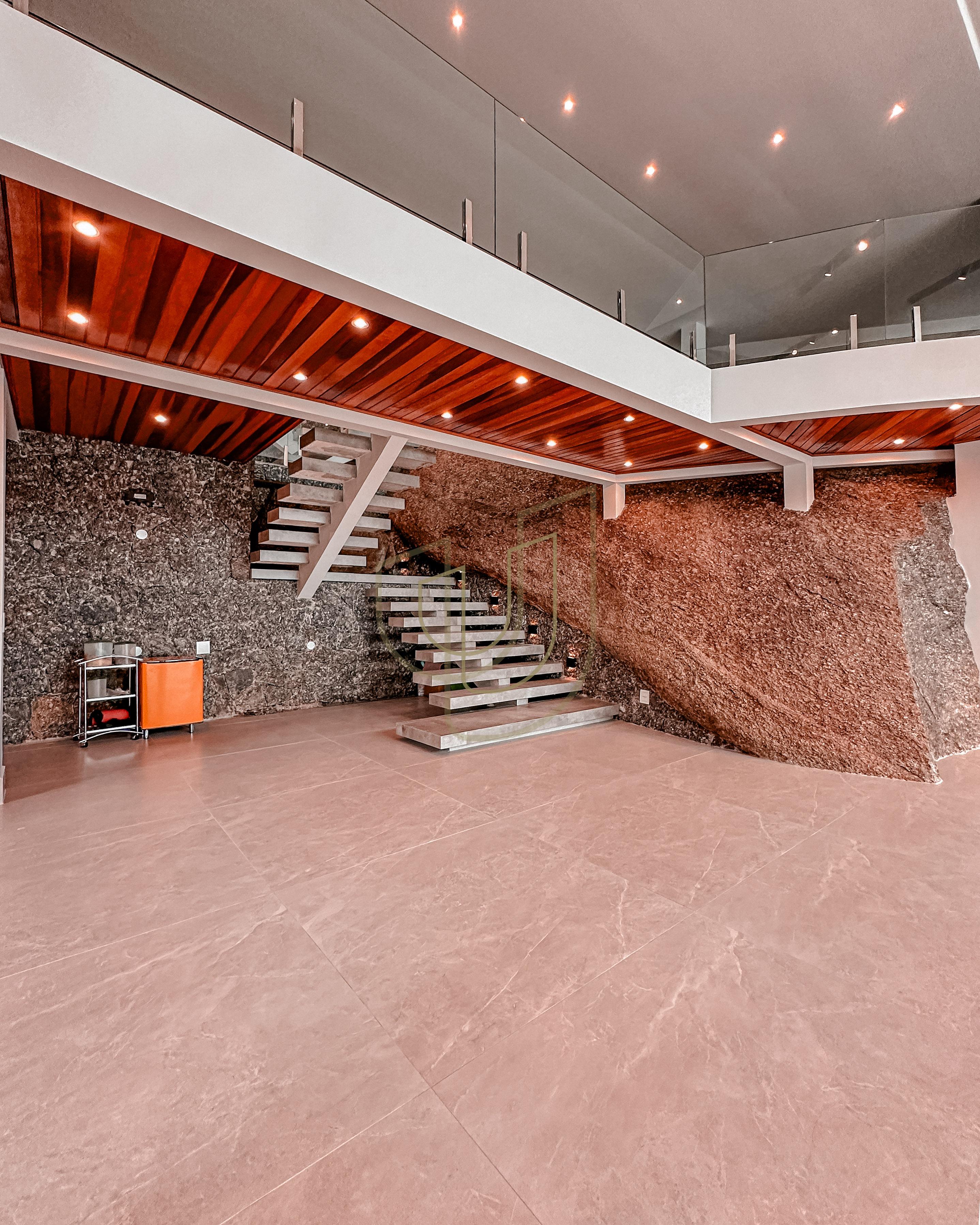 Mans&atilde;o de luxo com arquitetura em meio as rochas com 7 su&iacute;tes em Centro - Ilhabela/SP  Ilhabela - 