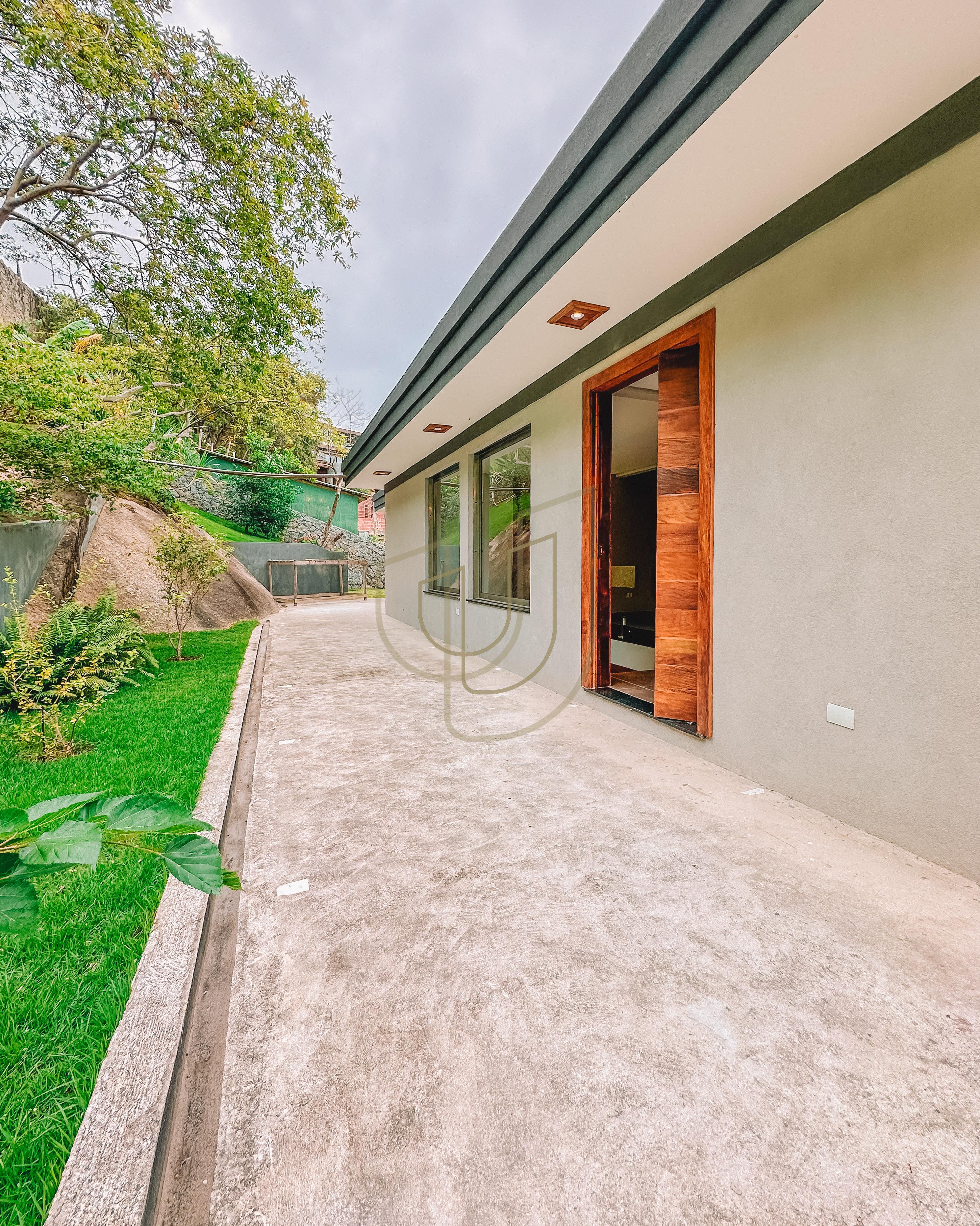 Mans&atilde;o de luxo com arquitetura em meio as rochas com 7 su&iacute;tes em Centro - Ilhabela/SP  Ilhabela - 