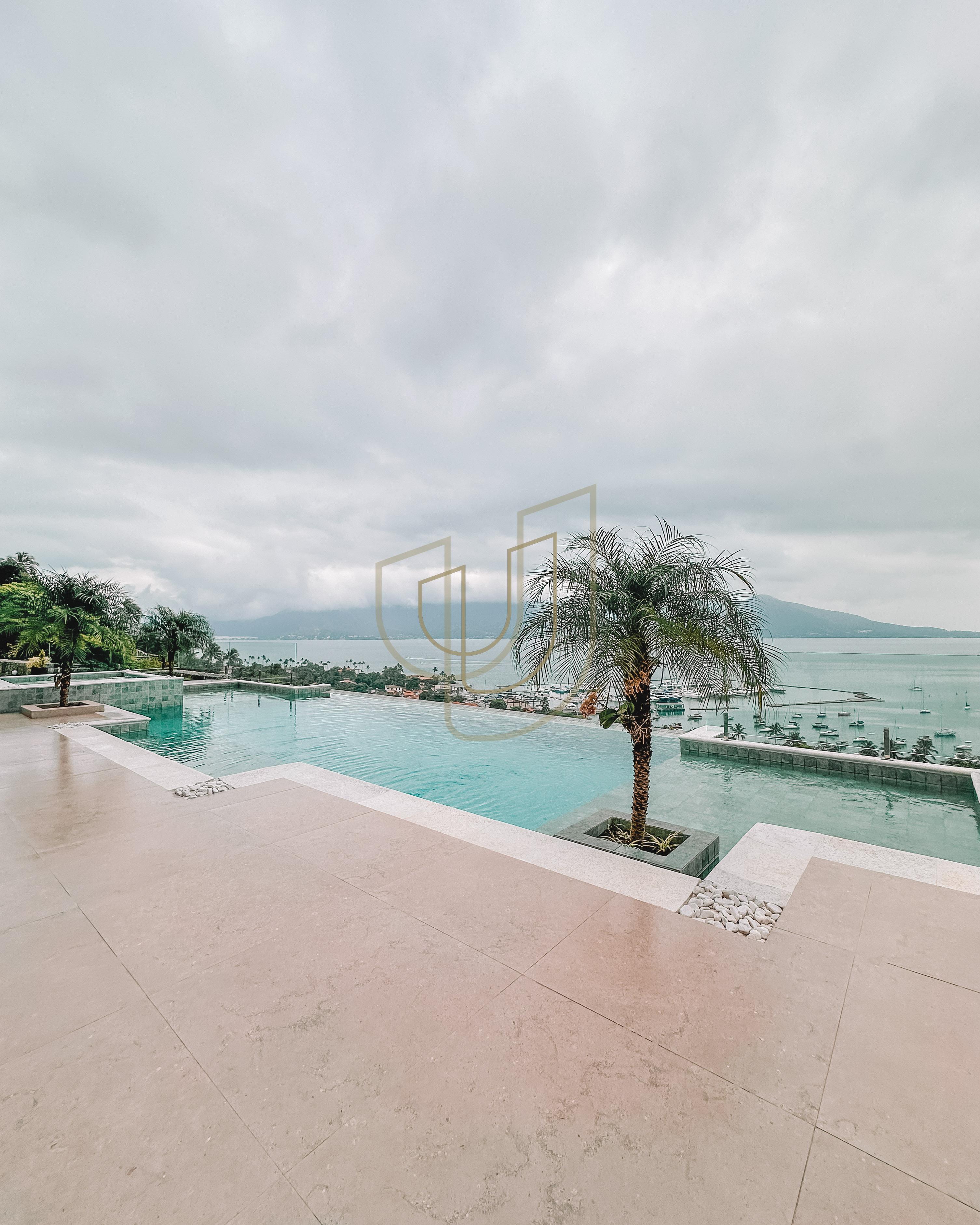 Mans&atilde;o de luxo com arquitetura em meio as rochas com 7 su&iacute;tes em Centro - Ilhabela/SP  Ilhabela - 