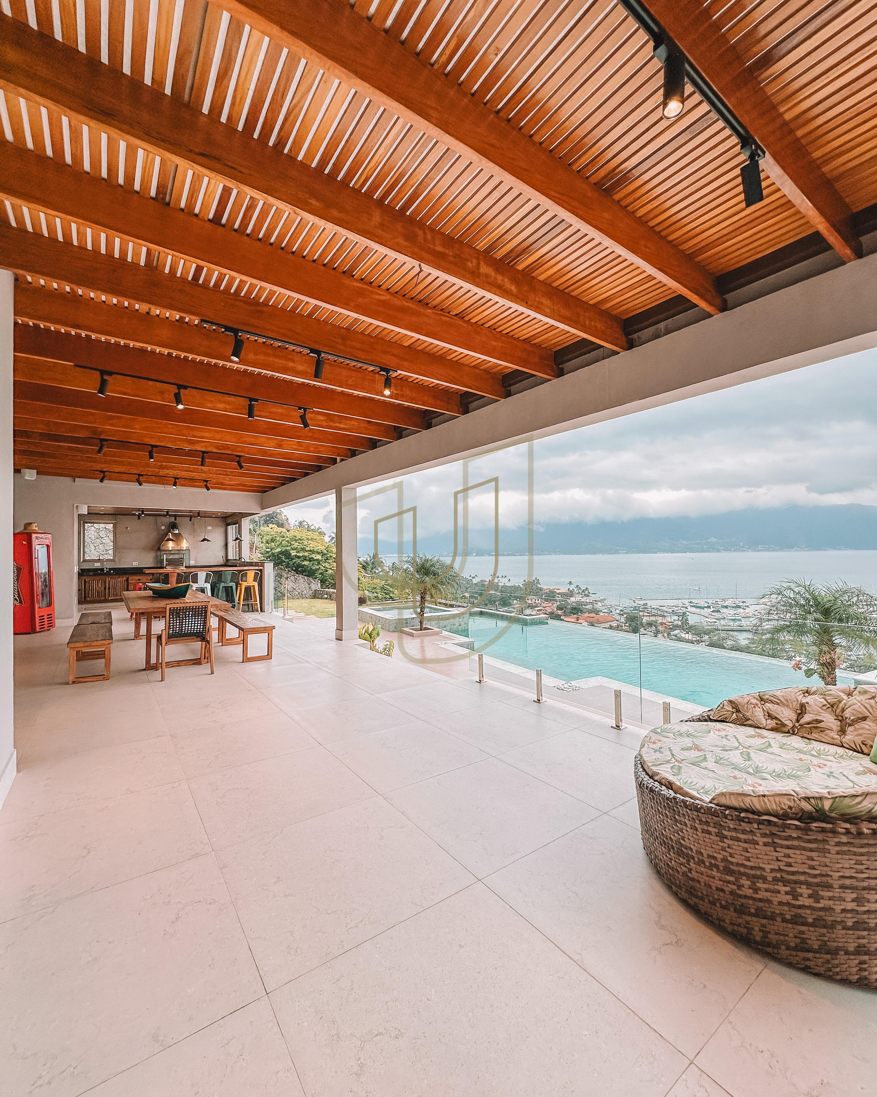 Mans&atilde;o de luxo com arquitetura em meio as rochas com 7 su&iacute;tes em Centro - Ilhabela/SP  Ilhabela - 