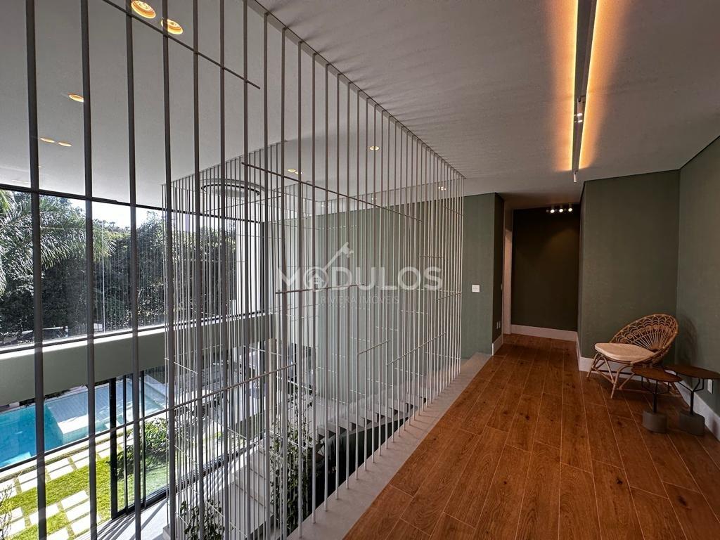 Mansão atemporal com 8 suítes à venda, 800 m² por R$ 27.800.000,00 Alameda Curaçau Bertioga - 