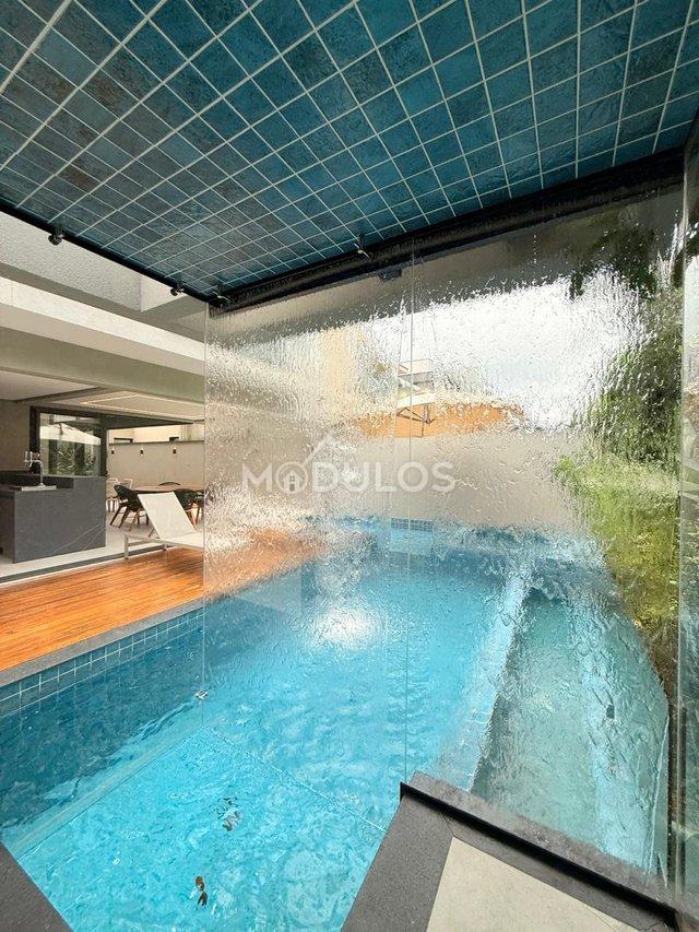 Propriedade minimalista com 5 suítes à venda, 409 m² por R$ 8.500.000,00 Alameda Baguio Bertioga - 