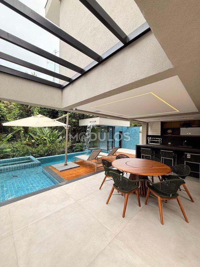 Propriedade minimalista com 5 suítes à venda, 409 m² por R$ 8.500.000,00 Alameda Baguio Bertioga - 