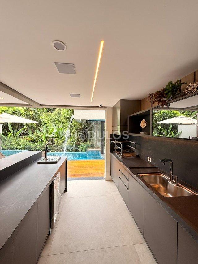 Propriedade minimalista com 5 suítes à venda, 409 m² por R$ 8.500.000,00 Alameda Baguio Bertioga - 