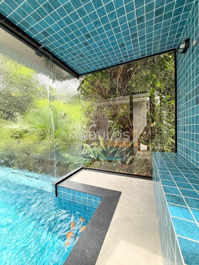 Propriedade minimalista com 5 suítes à venda, 409 m² por R$ 8.500.000,00 Alameda Baguio Bertioga - 