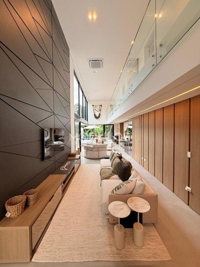 Propriedade minimalista com 5 suítes à venda, 409 m² por R$ 8.500.000,00 Alameda Baguio Bertioga - 