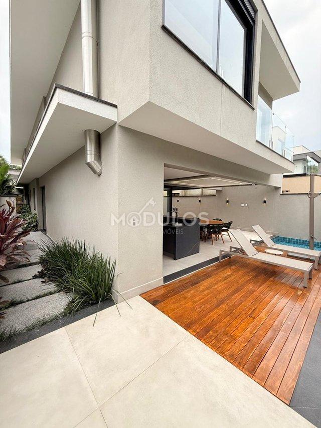 Propriedade minimalista com 5 suítes à venda, 409 m² por R$ 8.500.000,00 Alameda Baguio Bertioga - 