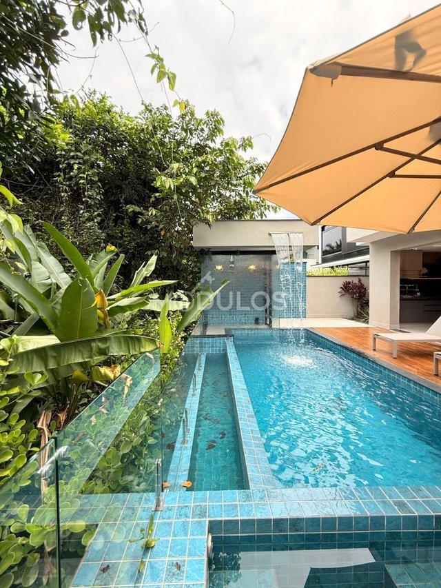 Propriedade minimalista com 5 suítes à venda, 409 m² por R$ 8.500.000,00 Alameda Baguio Bertioga - 