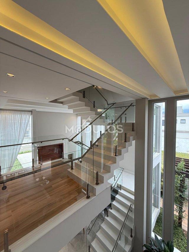 Mansão com três pavimentos, elevador, 7 suítes à venda, 555 m² por R$ 13.500.000,00 Alameda Maio Bertioga - 