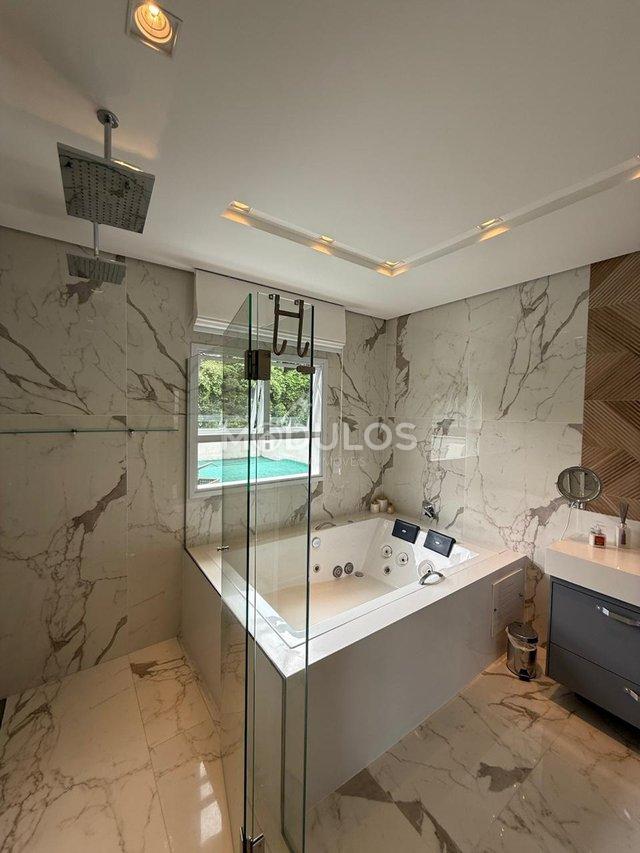 Mansão com três pavimentos, elevador, 7 suítes à venda, 555 m² por R$ 13.500.000,00 Alameda Maio Bertioga - 