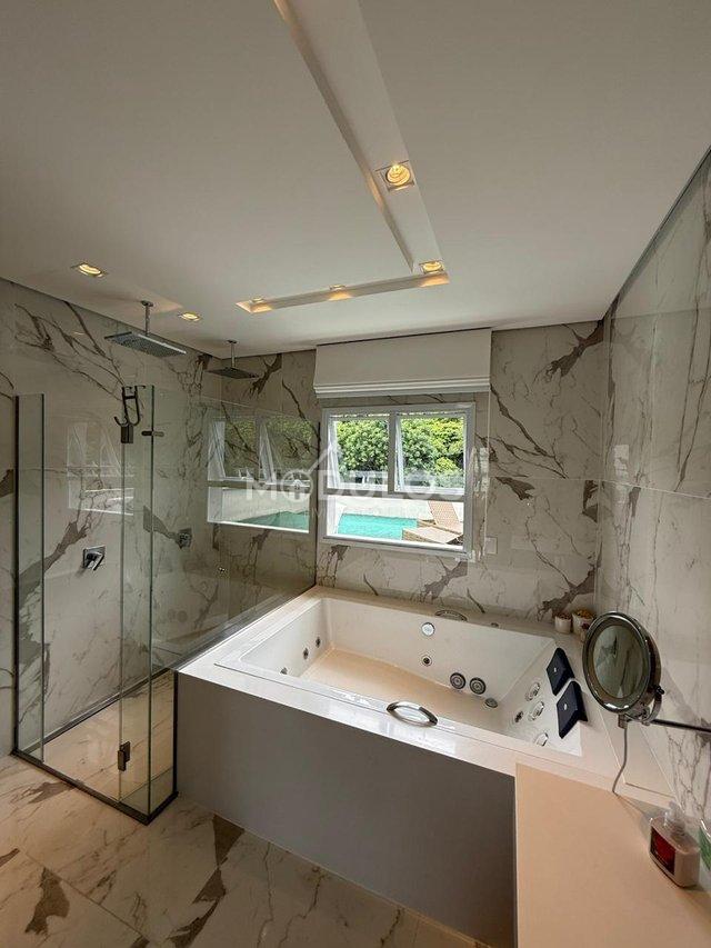 Mansão com três pavimentos, elevador, 7 suítes à venda, 555 m² por R$ 13.500.000,00 Alameda Maio Bertioga - 