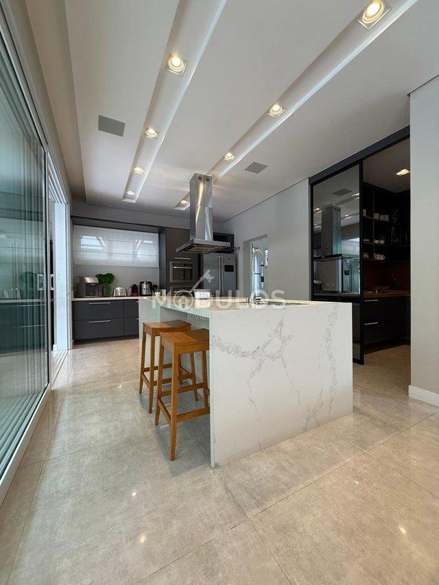 Mansão com três pavimentos, elevador, 7 suítes à venda, 555 m² por R$ 13.500.000,00 Alameda Maio Bertioga - 