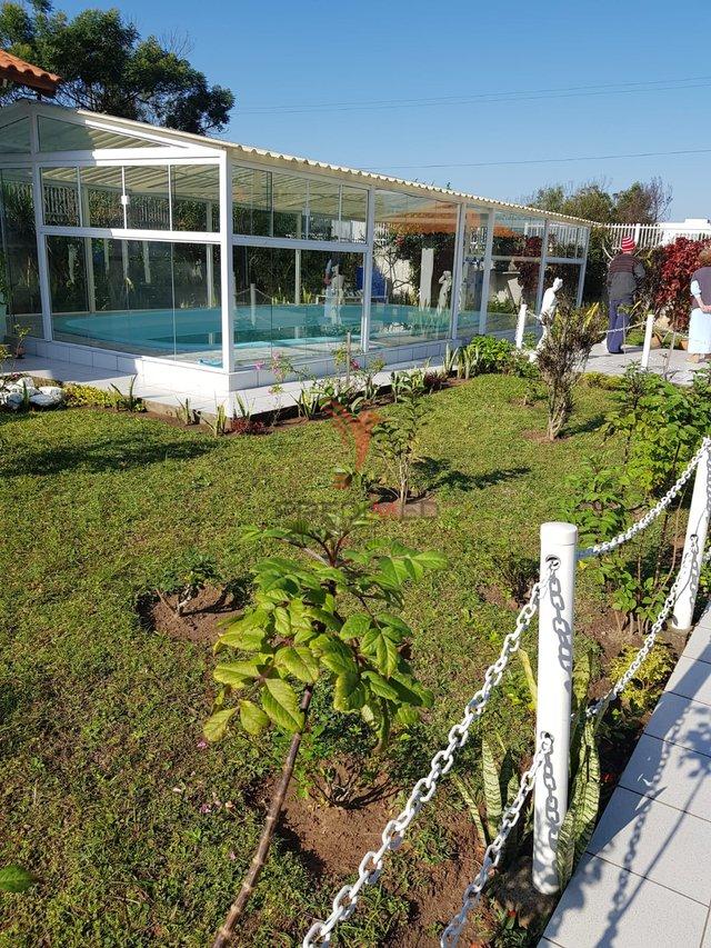 Lindo, muito lindo, situado a duas quadras da praia, 5 imóveis, com academia, piscina rua Manuel Domingos  Laguna - 
