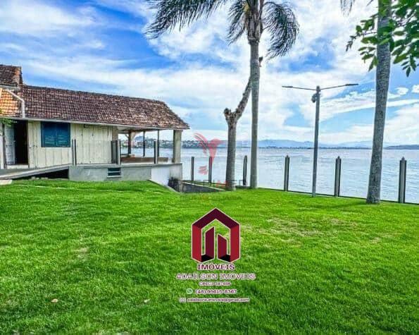 Casa Exclusiva Frente Mar em Florian&oacute;polis Cacup&eacute;  5 Quartos com Acesso Privativo &agrave; Praia Servidão Cacupé Florianópolis - 