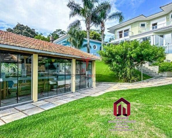 Casa Exclusiva Frente Mar em Florian&oacute;polis Cacup&eacute;  5 Quartos com Acesso Privativo &agrave; Praia Servidão Cacupé Florianópolis - 