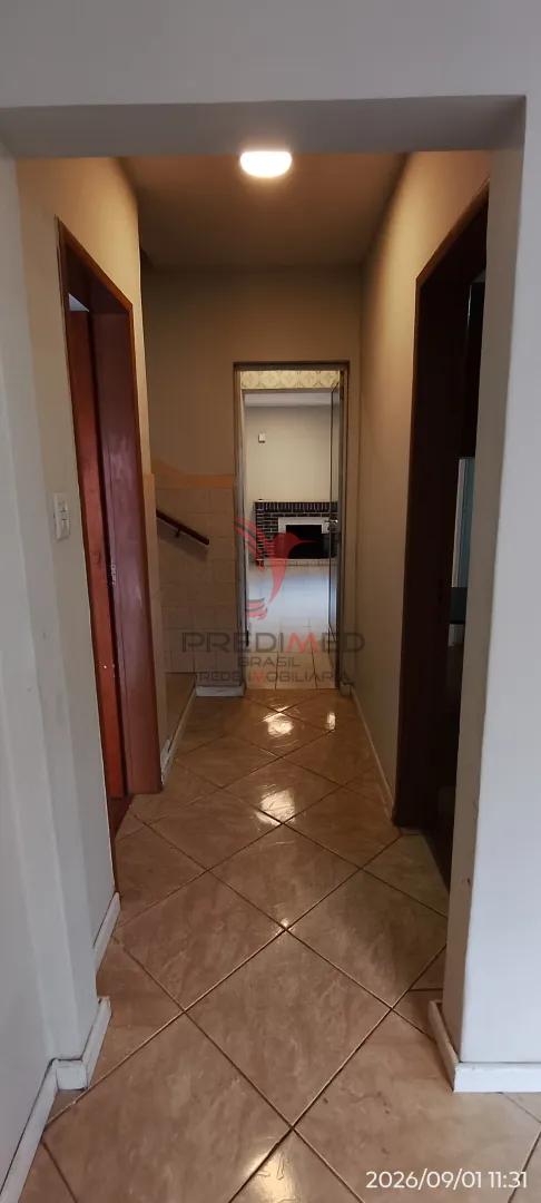 PRONTO PARA MORAR NO CENTRO: SOBRADO DE 3 DORMS, SUITE E 2 VAGAS  Pelotas - 