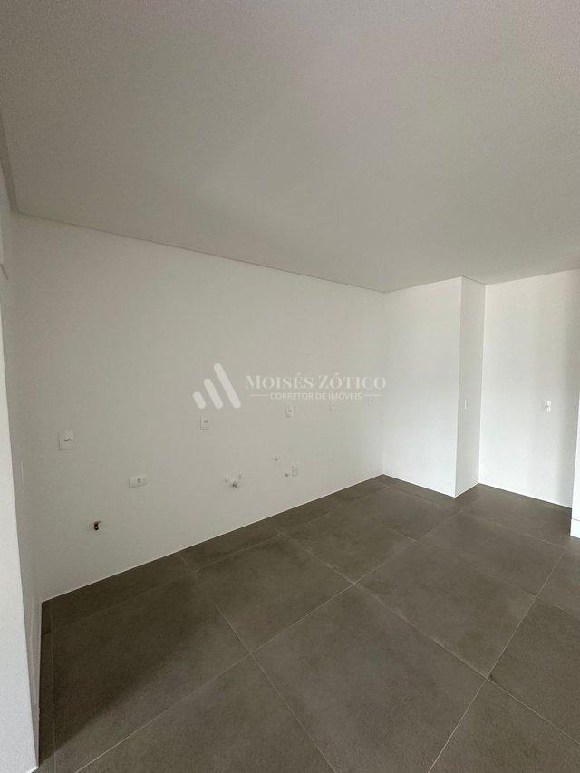 Apartamento de 3 suítes e 2 vagas de garagem em Meia Praia Rua 256 Itapema - 