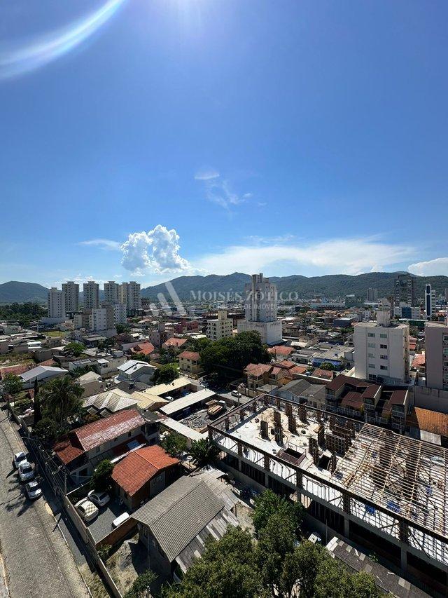 Apartamento de 3 suítes e 2 vagas de garagem em Meia Praia Rua 256 Itapema - 