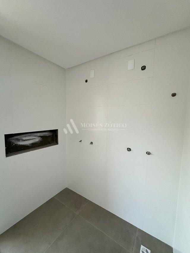 Apartamento de 3 suítes e 2 vagas de garagem em Meia Praia Rua 256 Itapema - 