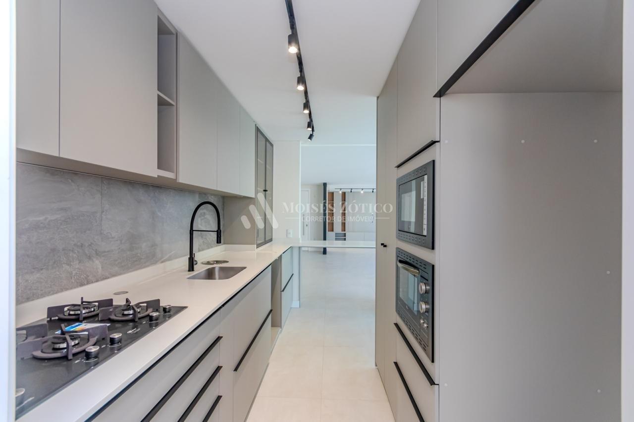 Apartamento semimobiliado de 4 suítes em Meia Praia Rua 234 Itapema - 