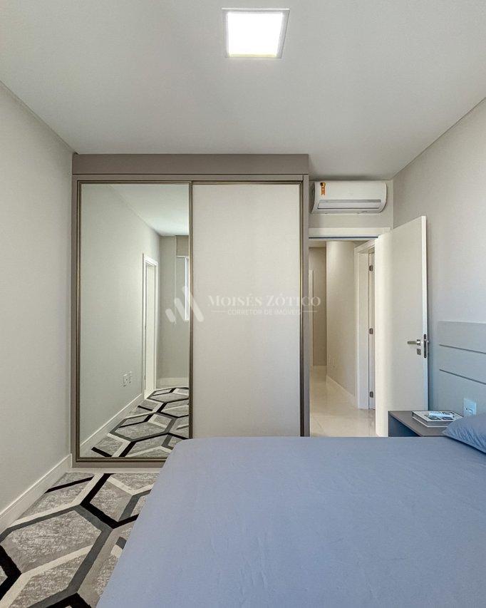 Apartamento mobiliado com 4 suítes e 3 vagas de garagem em Meia Praia Rua 256 Itapema - 