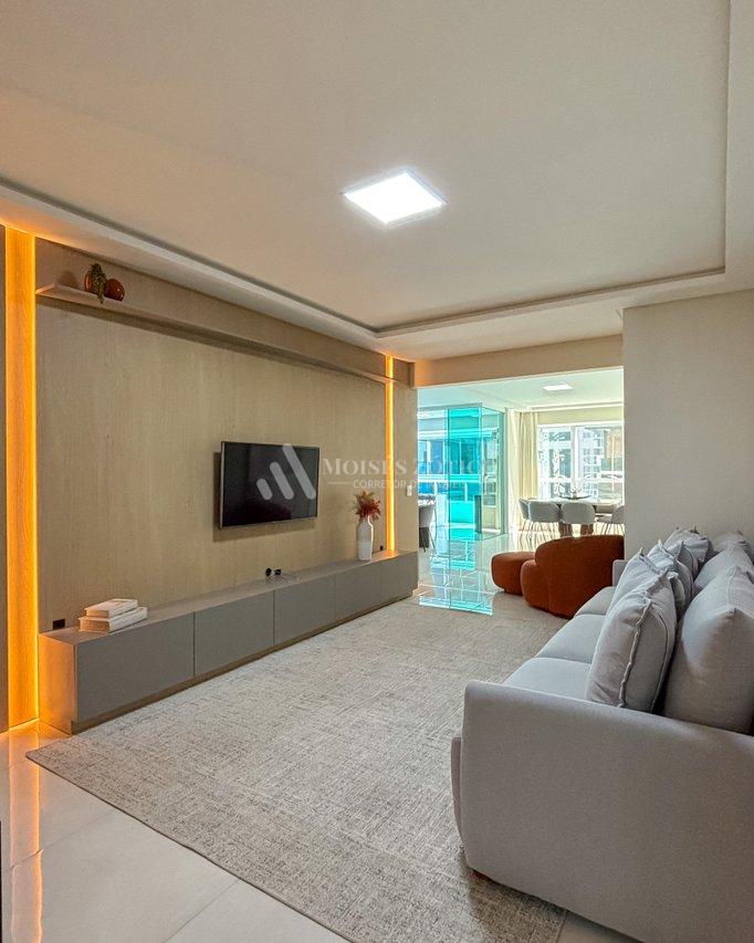 Apartamento mobiliado com 4 suítes e 3 vagas de garagem em Meia Praia Rua 256 Itapema - 