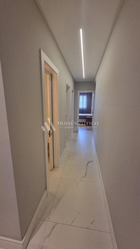 Apartamento mobiliado com 3 suítes e 4 vagas de garagem em Meia Praia Rua 238 Itapema - 