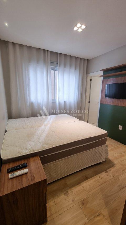 Apartamento mobiliado com 3 suítes e 4 vagas de garagem em Meia Praia Rua 238 Itapema - 