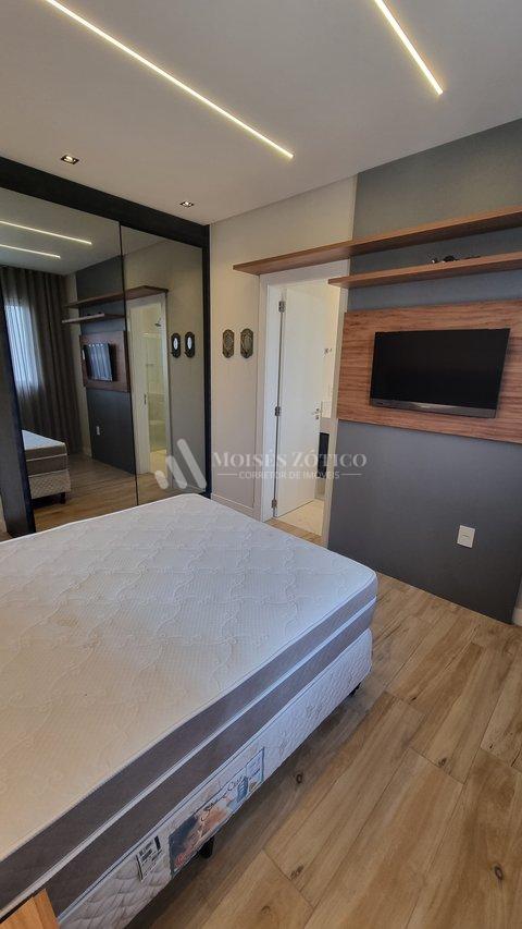 Apartamento mobiliado com 3 suítes e 4 vagas de garagem em Meia Praia Rua 238 Itapema - 
