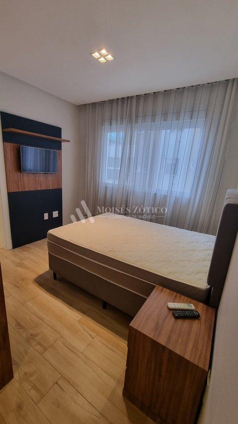 Apartamento mobiliado com 3 suítes e 4 vagas de garagem em Meia Praia Rua 238 Itapema - 