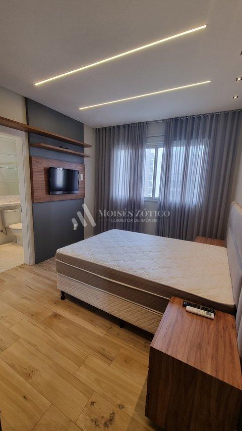 Apartamento mobiliado com 3 suítes e 4 vagas de garagem em Meia Praia Rua 238 Itapema - 