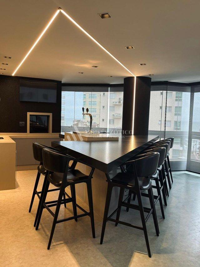Apartamento mobiliado de 4 sauítes e 4 vagas de garagem em Meia Praia Rua 279 Itapema - 