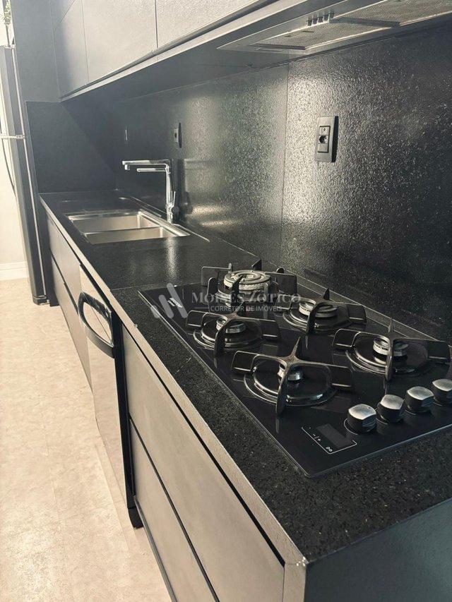 Apartamento mobiliado de 4 sauítes e 4 vagas de garagem em Meia Praia Rua 279 Itapema - 