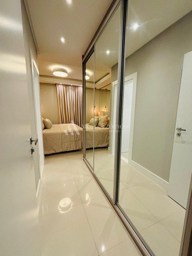 Apartamento mobiliado de 4 sauítes e 4 vagas de garagem em Meia Praia Rua 279 Itapema - 