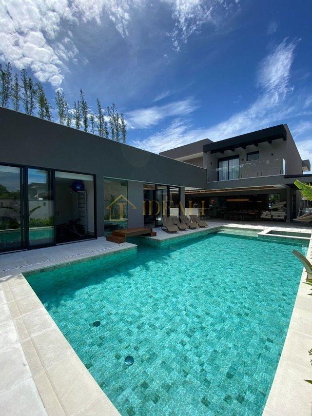 Casa com 5 dormitórios à venda, 592 m² por R$ 11.800.000 - Riviera de São Lourenço - Rua Passeio Do Sol Bertioga - 