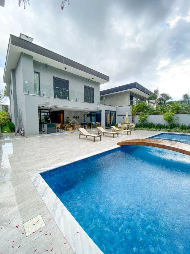 Casa com 6 dormitórios à venda, 464 m² por R$ 9.700.000 - Riviera de São Lourenço - Rua Passeio Do Sol Bertioga - 