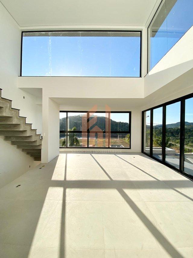 Casa em condomínio fechado com 03 suítes e incrível vista para área de preservação Rua Joaquim Garcia Camboriú - 