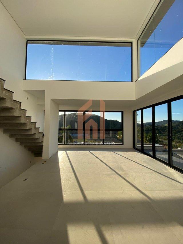 Casa em condomínio fechado com 03 suítes e incrível vista para área de preservação Rua Joaquim Garcia Camboriú - 