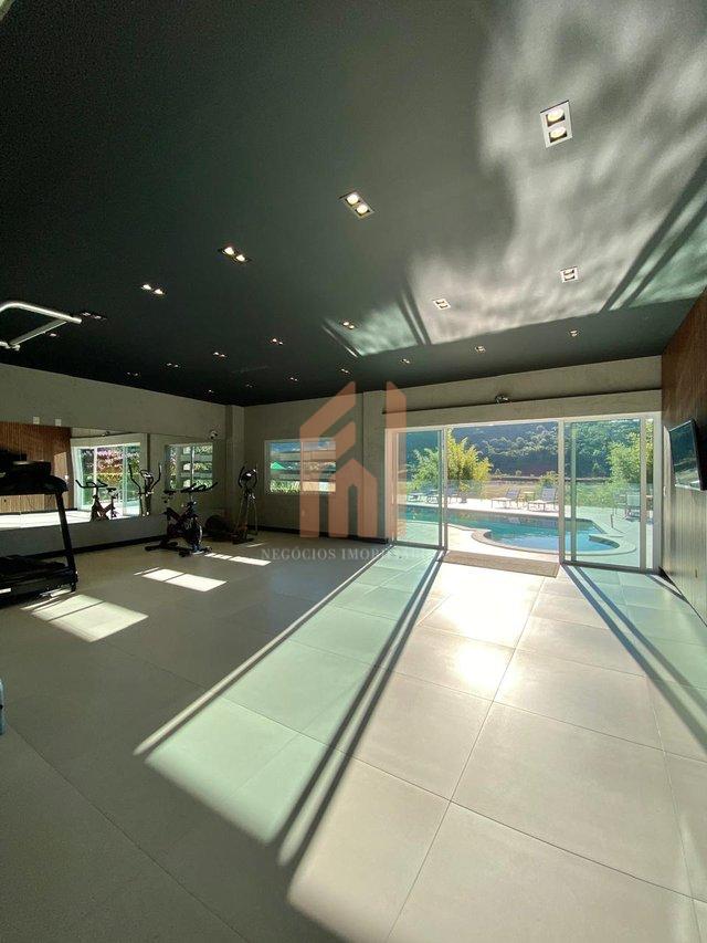 Casa em condomínio fechado com 03 suítes e incrível vista para área de preservação Rua Joaquim Garcia Camboriú - 