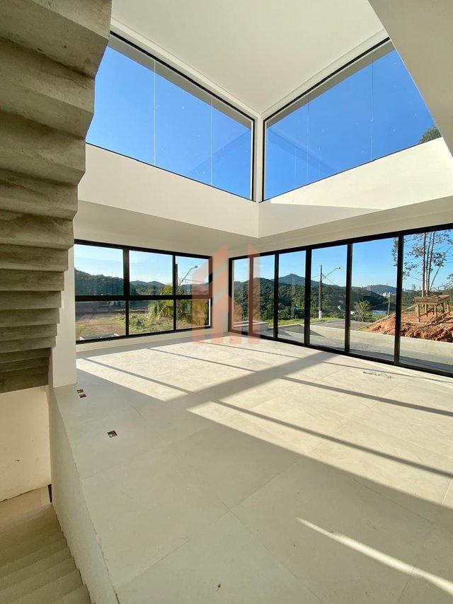 Casa em condomínio fechado com 03 suítes e incrível vista para área de preservação Rua Joaquim Garcia Camboriú - 